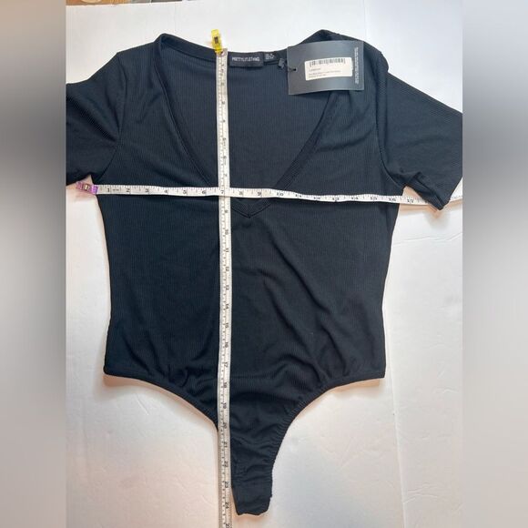 NWT PrettyLittleThing Plus Black Ribbed Plunge Short Sleeve Bodysuit Size 12 - Picture 13 of 15